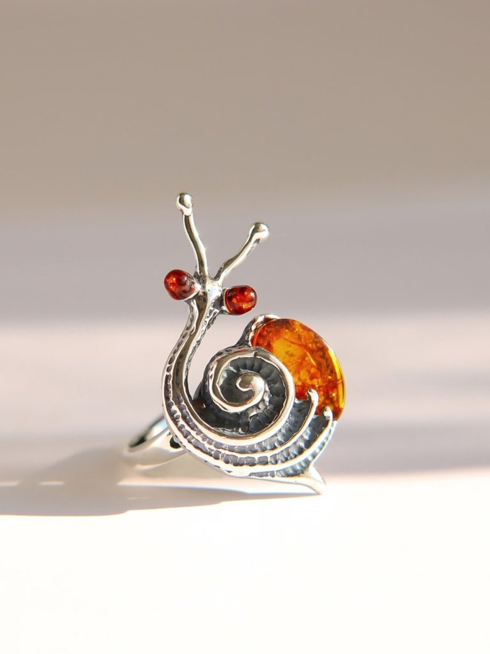 Baltic Amber Snail Ring in Sterling Silver